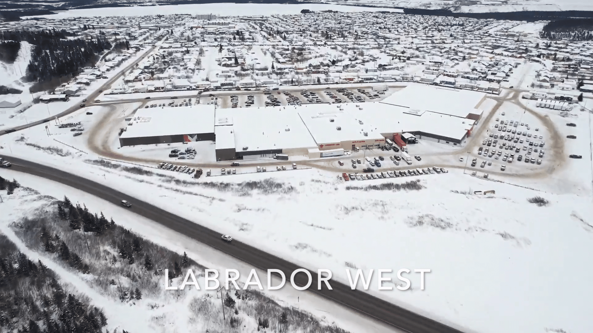Aerial footage of a snow-covered Labrador City-Wabush.