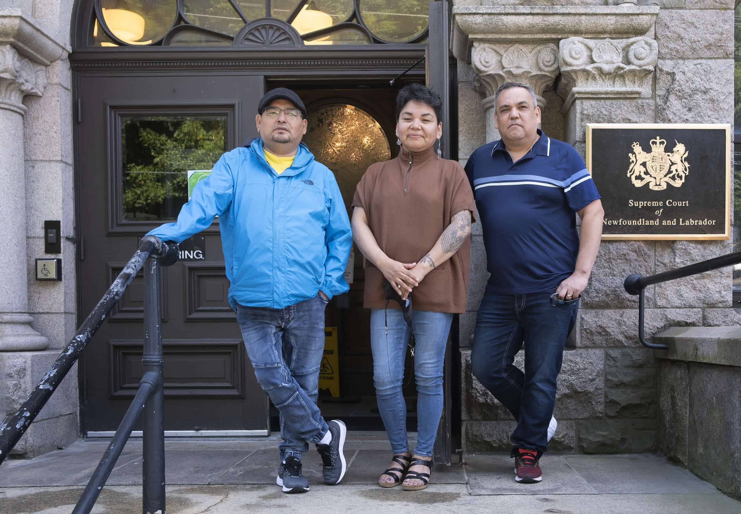 Innu Nation Grand Chief Etienne Rich, Deputy Grand Chief Mary Ann Nui and Chief Eugene Hart of the Sheshatshiu Innu First Nation outside the provincial Supreme Court in St. John's, NL.