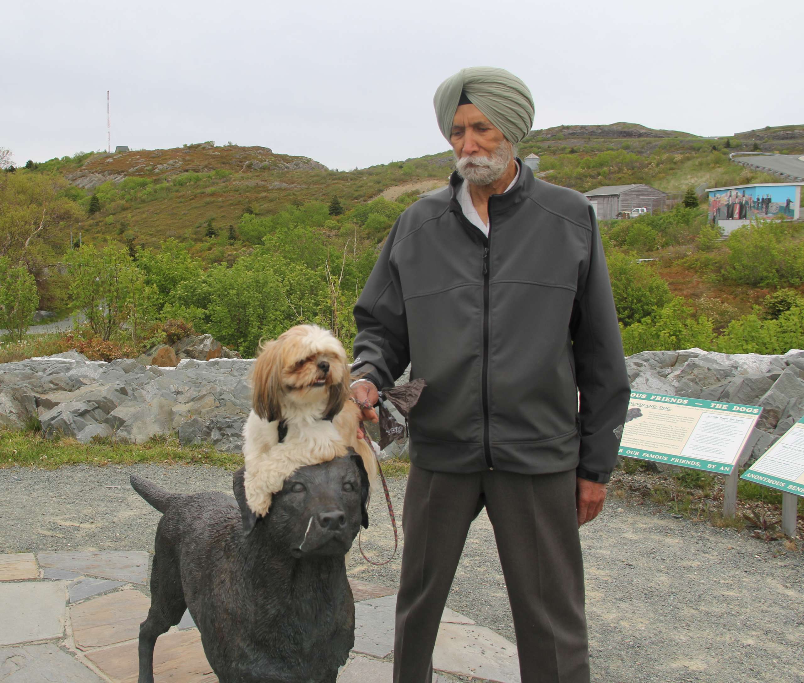 The late Puran Singh Cheema stands with Jem in St. John's, NL